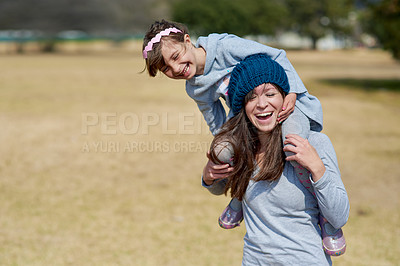 Buy stock photo Cropped shot of a mother and daughter bonding together at the park