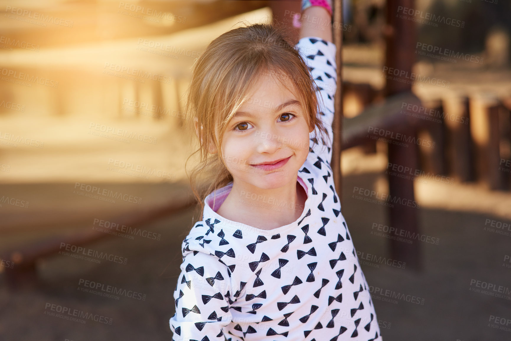 Buy stock photo Portrait of a little girl enjoying some time outdoors
