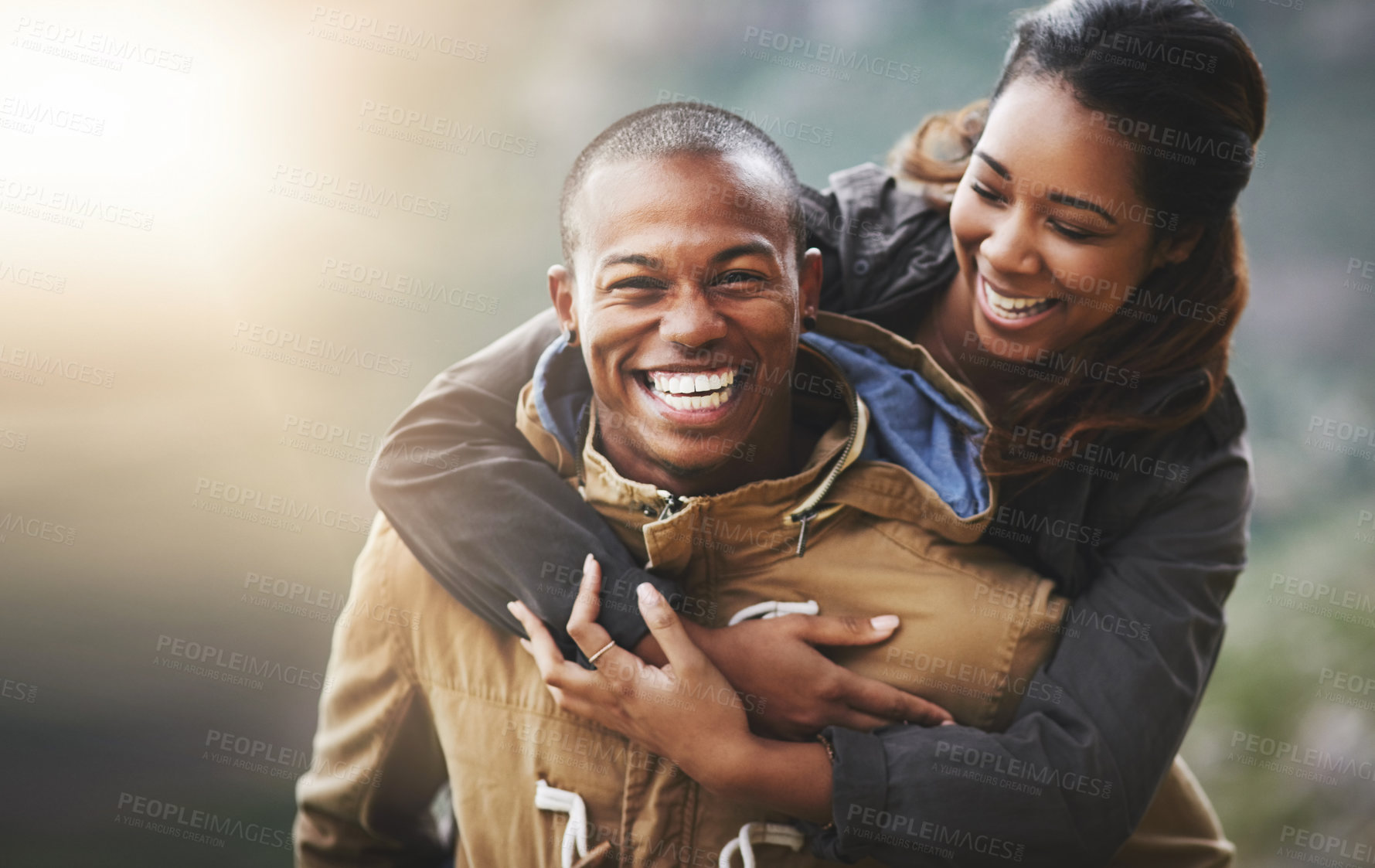 Buy stock photo Couple, love and portrait with piggyback outdoors for adventure, connection and vacation in nature. Woman, man and happy with smile by mountain for marriage romance, hiking and holiday trip together