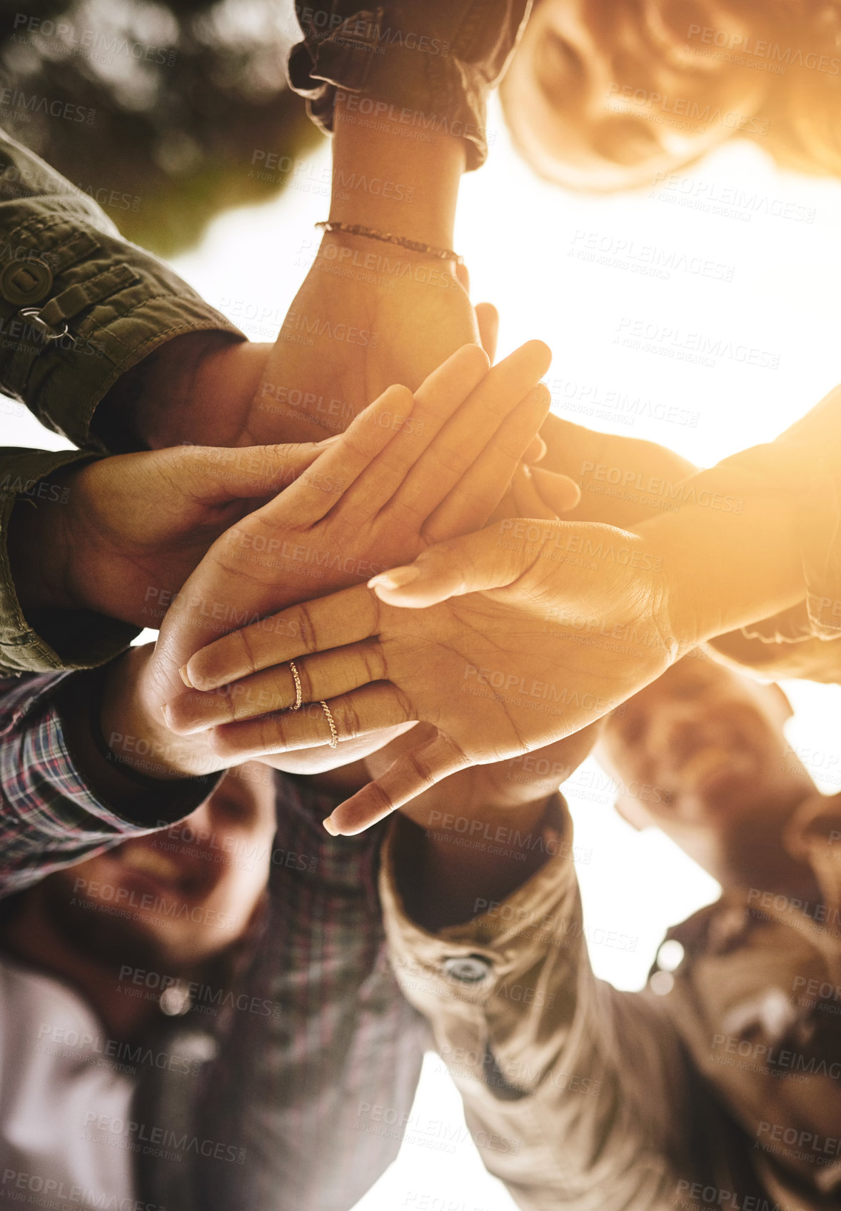 Buy stock photo People, hands and outdoor stack for support, love and bonding for united community in nature. Friends, palm and pile in low angle for trust in relationship, solidarity and together on vacation fun