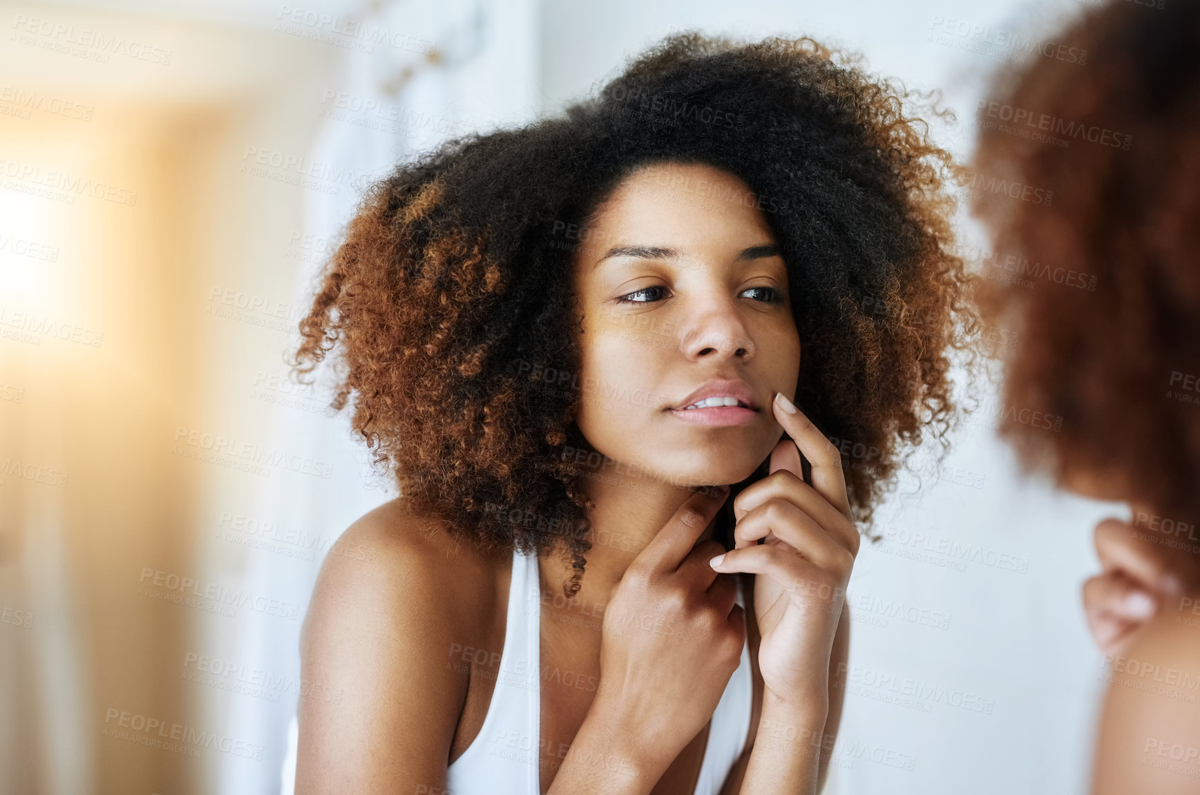 Buy stock photo Beauty, blemish and mirror with black woman in bathroom of home for natural dermatology or skincare. Checking, cleaning and face with reflection of person in apartment for morning grooming or hygiene