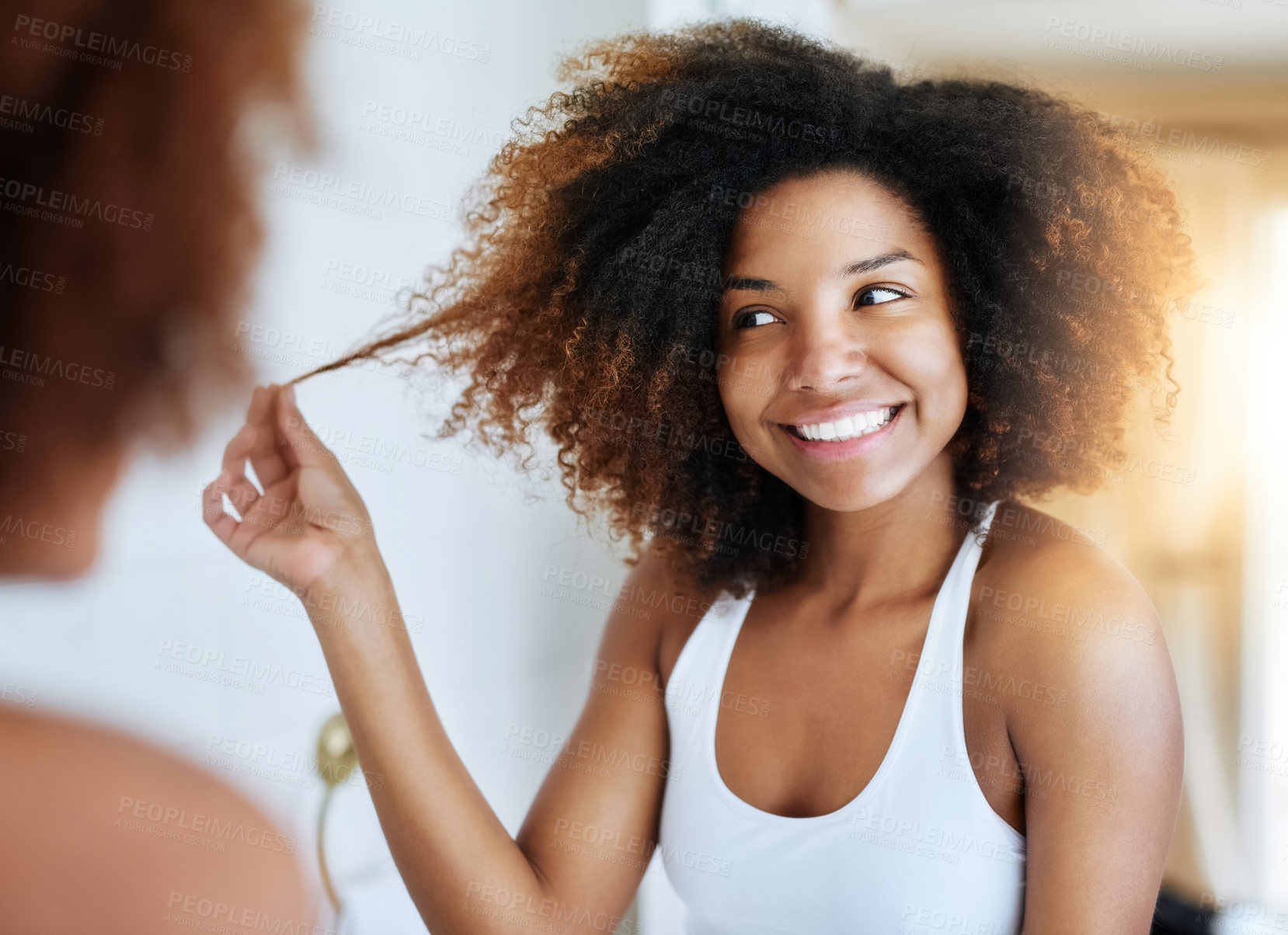 Buy stock photo Black woman, afro and mirror hair care in bathroom or curly treatment for healthy hygiene, washing or routine. Female person,  reflection and home apartment for morning wellness, texture or growth