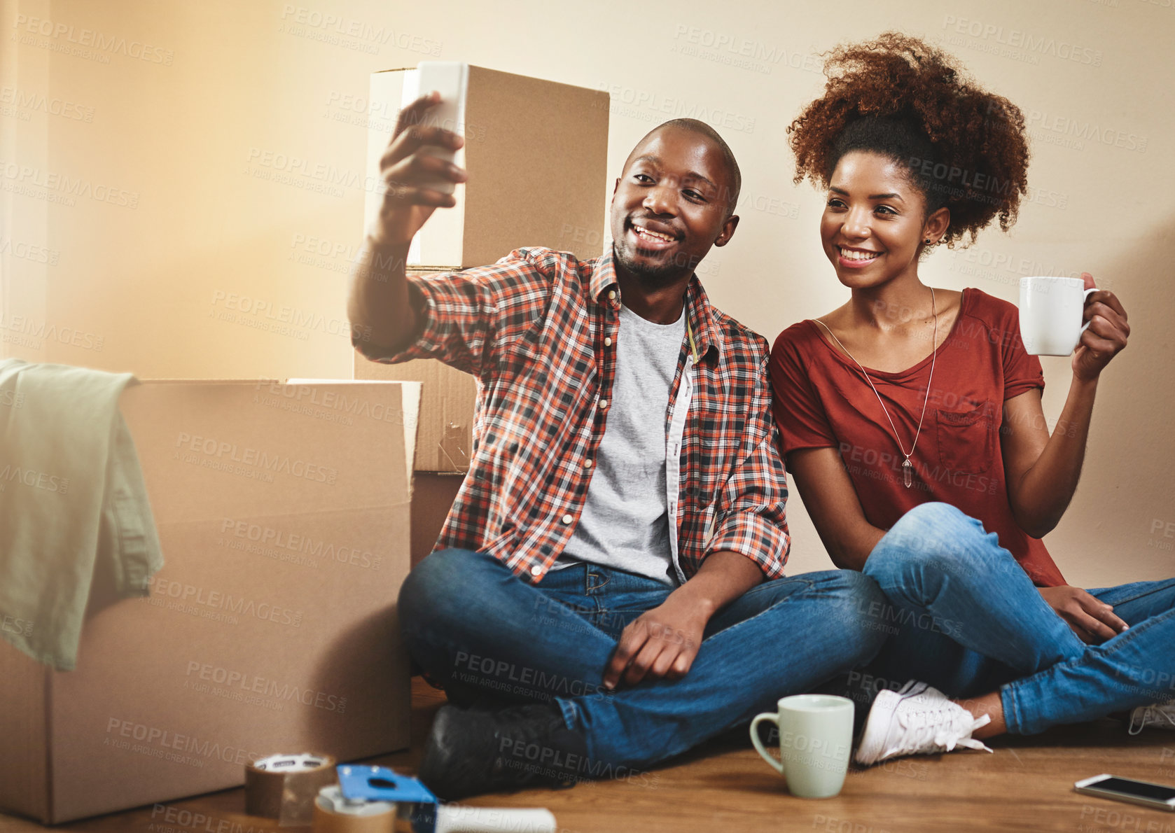 Buy stock photo Couple, moving and selfie in home with phone for social media, memory and relax in apartment. Happy, people and video call in new house with smartphone, live streaming and smile in property to rent 