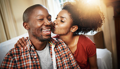 Buy stock photo Cropped shot of an affectionate young couple enjoying the day at home