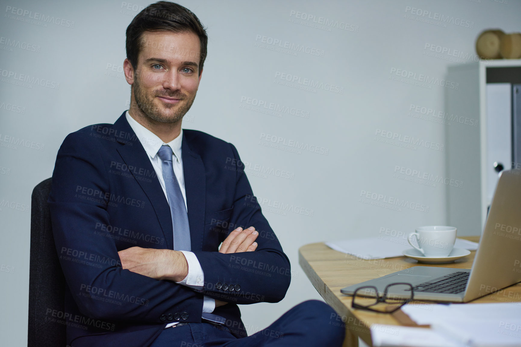 Buy stock photo Businessman, confident and portrait with tech in office, workplace or company as advertising executive. Male person, professional and smile at desk in corporate, job and career as management or boss