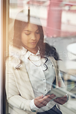 Buy stock photo Business woman with tablet, window and technology, web designer at startup with connection and email with SEO. Person at digital marketing agency, webdesign and wifi with website development