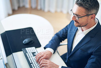 Buy stock photo Businessman, smile and working on computer, email or planning a budget in office. Happy worker and technology with research, typing and reading review for company report with problem solving insight
