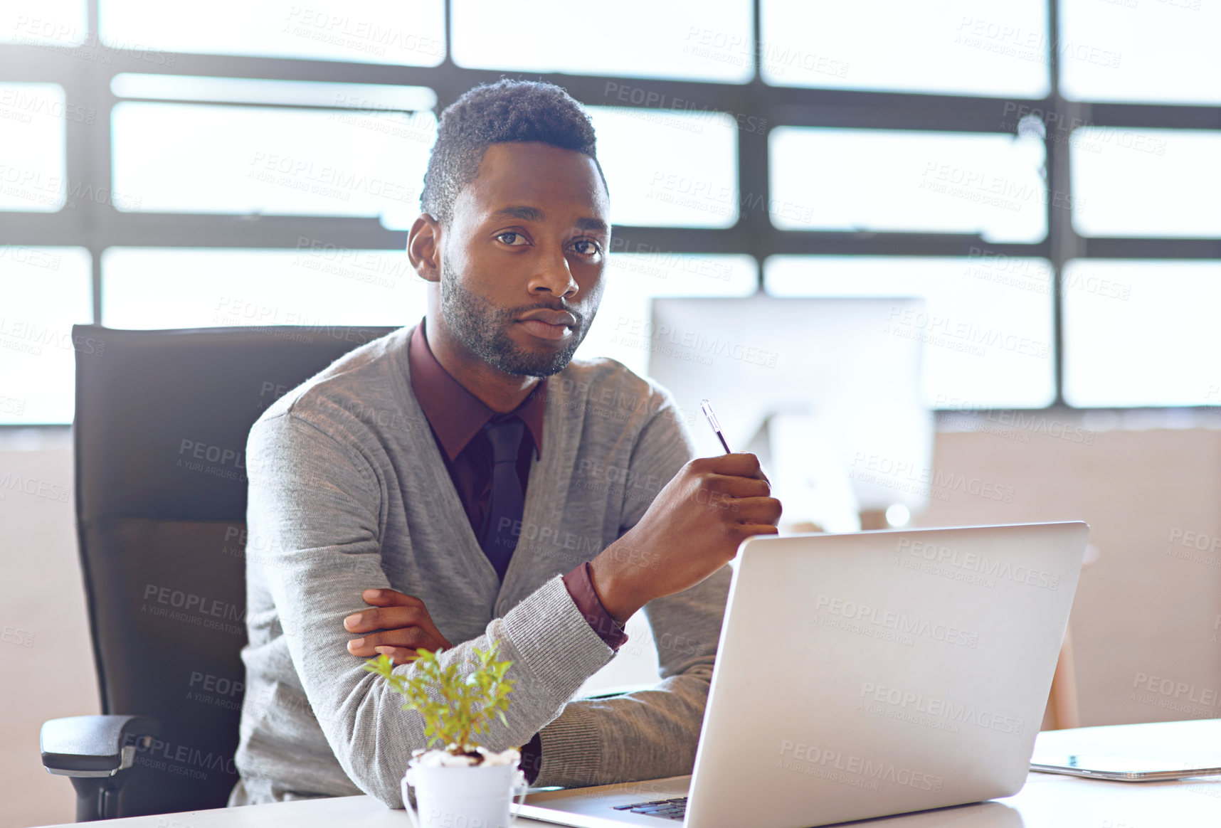 Buy stock photo Portrait, black man and technology on desk in office for creative job as web developer or graphic designer for company. Person, internet and online for website update or software reset for agency.