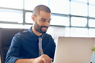 Buy stock photo Laptop, smile and strategy with a business man in the office, working online to finish a project at his desk. Computer, technology and email with a young male employee at work for company research