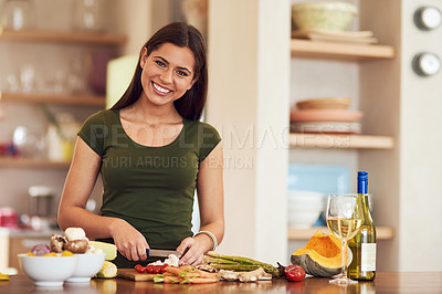 Buy stock photo Shot of an attractive young woman at home
