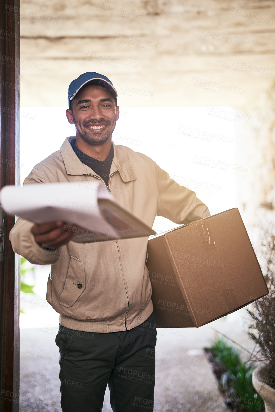 Buy stock photo Portrait of a courier making a delivery