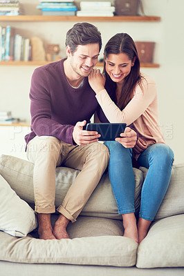 Buy stock photo Happy, couple and relax on sofa with tablet for social media, news or streaming video together. Digital technology, man and woman in living room for online shopping or reading blog on app in home