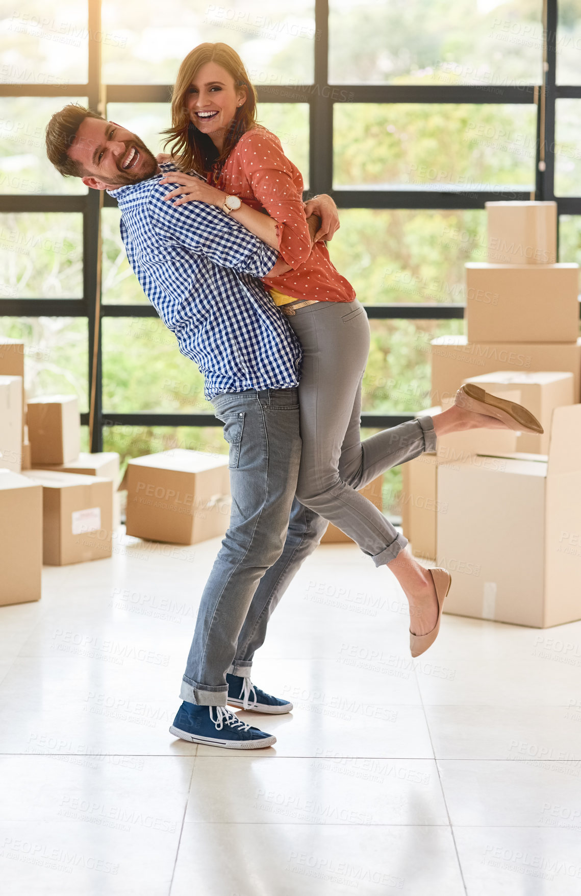 Buy stock photo Portrait, embrace and couple moving, boxes and real estate of new home, apartment and smile for mortgage. House, man and woman with hug for loan, cardboard and love in property, together and happy