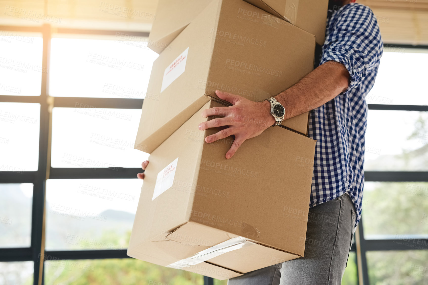 Buy stock photo Man, moving and carry a stack of boxes in house with transport, delivery or home relocation. Lifting, package and person walking in apartment or real estate to rent with help of courier to support