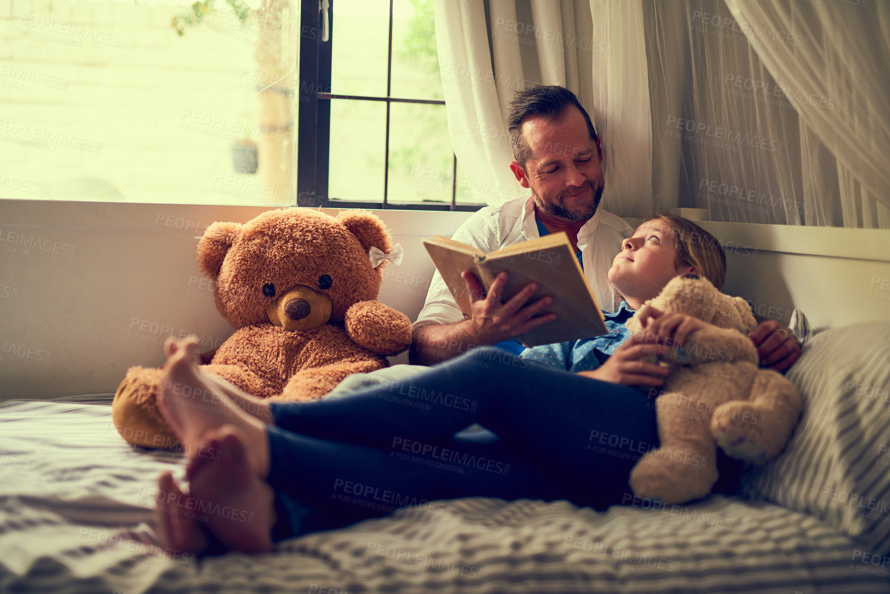 Buy stock photo Bedtime, reading book or teddy bear with father and daughter in bedroom of home together for bonding. Storytelling, family or love with single parent man or girl child on bed in apartment to relax