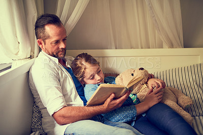 Buy stock photo Home, girl and father with book for reading story, bonding together and connection with fantasy. Bed, dad and daughter for listening to storytelling, education and kid for cognitive development