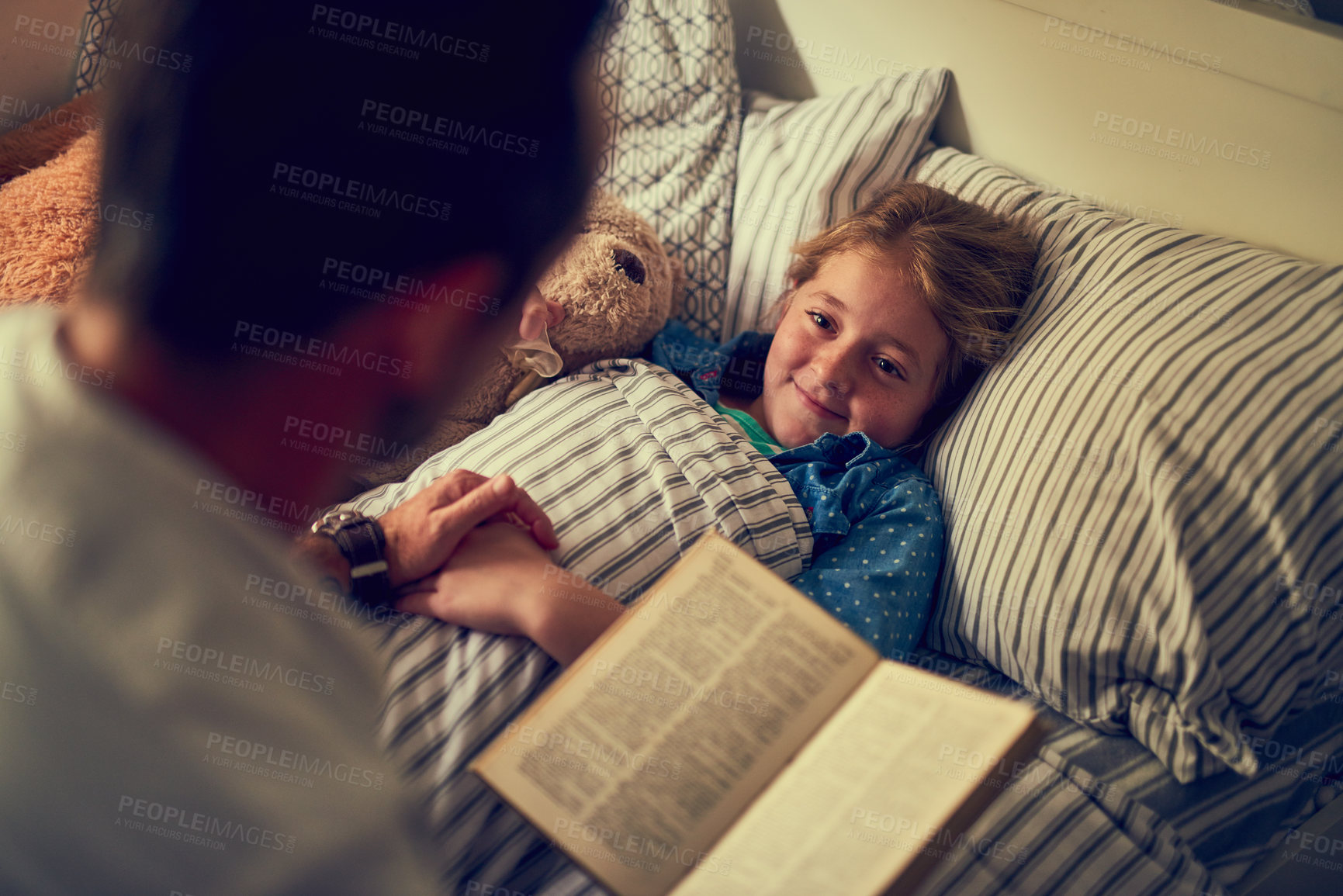 Buy stock photo Bed, child and dad with book for reading story, bonding together and connection with fantasy. Home, father and daughter to listen to storytelling, education and curious girl for cognitive development