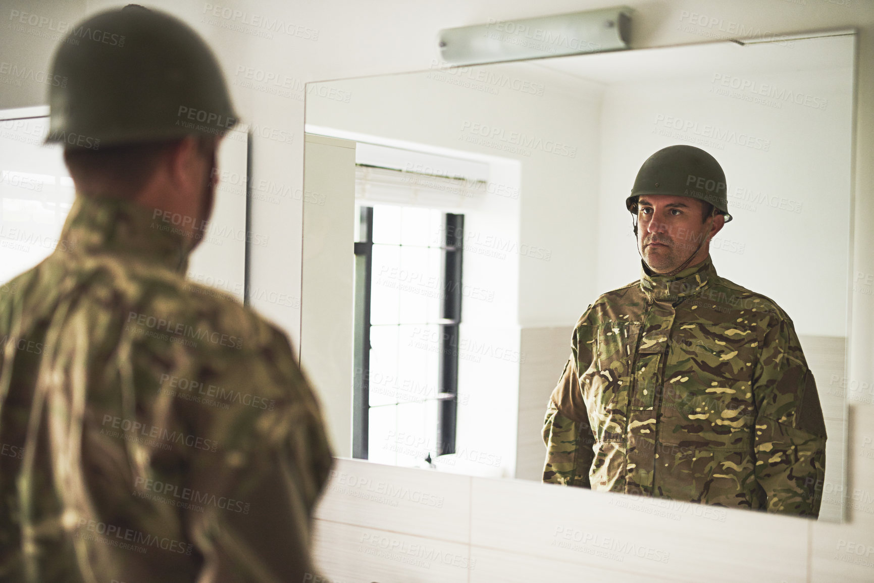 Buy stock photo Soldier, mirror and man in uniform, home and mental health with psychology, doubt and sad. Apartment, reflection and trooper with anxiety, depression or army fighter with service, military or veteran