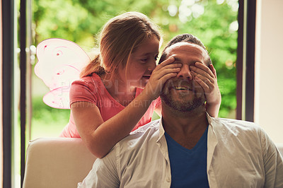 Buy stock photo Home, father and child with peekaboo for play, laughing and bonding together with games. Family house, dad and daughter with connection, cover eyes and girl in living room with caring parent on sofa