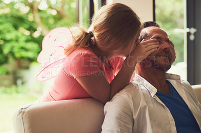 Buy stock photo Home, dad and child with peekaboo for play, laughing and bonding together with games. Family house, parent and daughter with connection, cover eyes and girl in living room with caring father on sofa