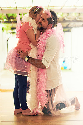 Buy stock photo Secret, whispering or dad in home with girl princess speaking of pink costume, playing or parent. Family, private conversation or father with child for dress up, gossip news or games with fairy wings