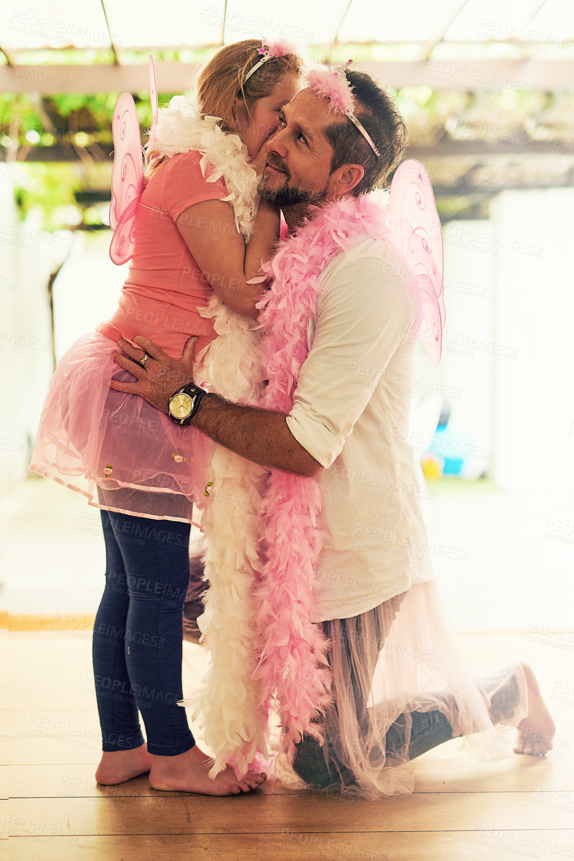 Buy stock photo Secret, whispering or dad in home with girl princess speaking of pink costume, playing or parent. Family, private conversation or father with child for dress up, gossip news or games with fairy wings