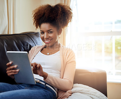 Buy stock photo Woman, typing and home or portrait on tablet, relax and internet communication or social media scrolling. Reading, text and blog or online networking, meme and funny on tech on sofa in apartment