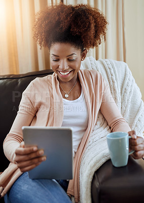 Buy stock photo Home, coffee and black woman with tablet, relax or connection with lens flare, internet or digital app. African person, apartment or happy girl on couch, tech or smile with tea, latte or social media