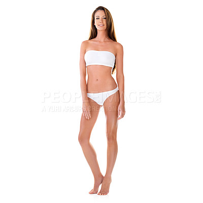 Buy stock photo Studio portrait of a beautiful young brunette woman in a white bikini isolated on white
