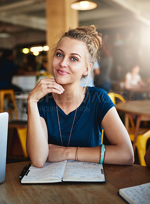 Buy stock photo Portrait of a young student studying in a cafe
