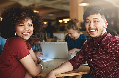Buy stock photo Shot of students studying in a coffee shop