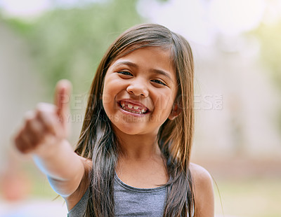 Buy stock photo Thumbs up, smile and girl outdoor with portrait for cheerful, fun and playing childhood game. Thank you, happiness and young child with excited facial for agreement, yes and approval or satisfaction