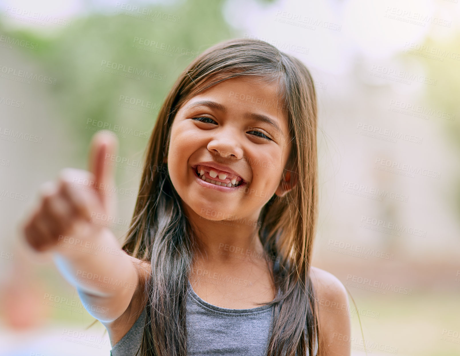 Buy stock photo Thumbs up, smile and girl outdoor with portrait for cheerful, fun and playing childhood game. Thank you, happiness and young child with excited facial for agreement, yes and approval or satisfaction