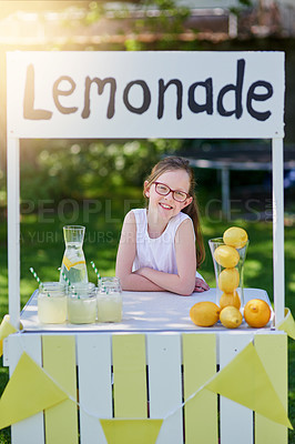 Buy stock photo Portrait of a little girl selling lemonade from her stand outside