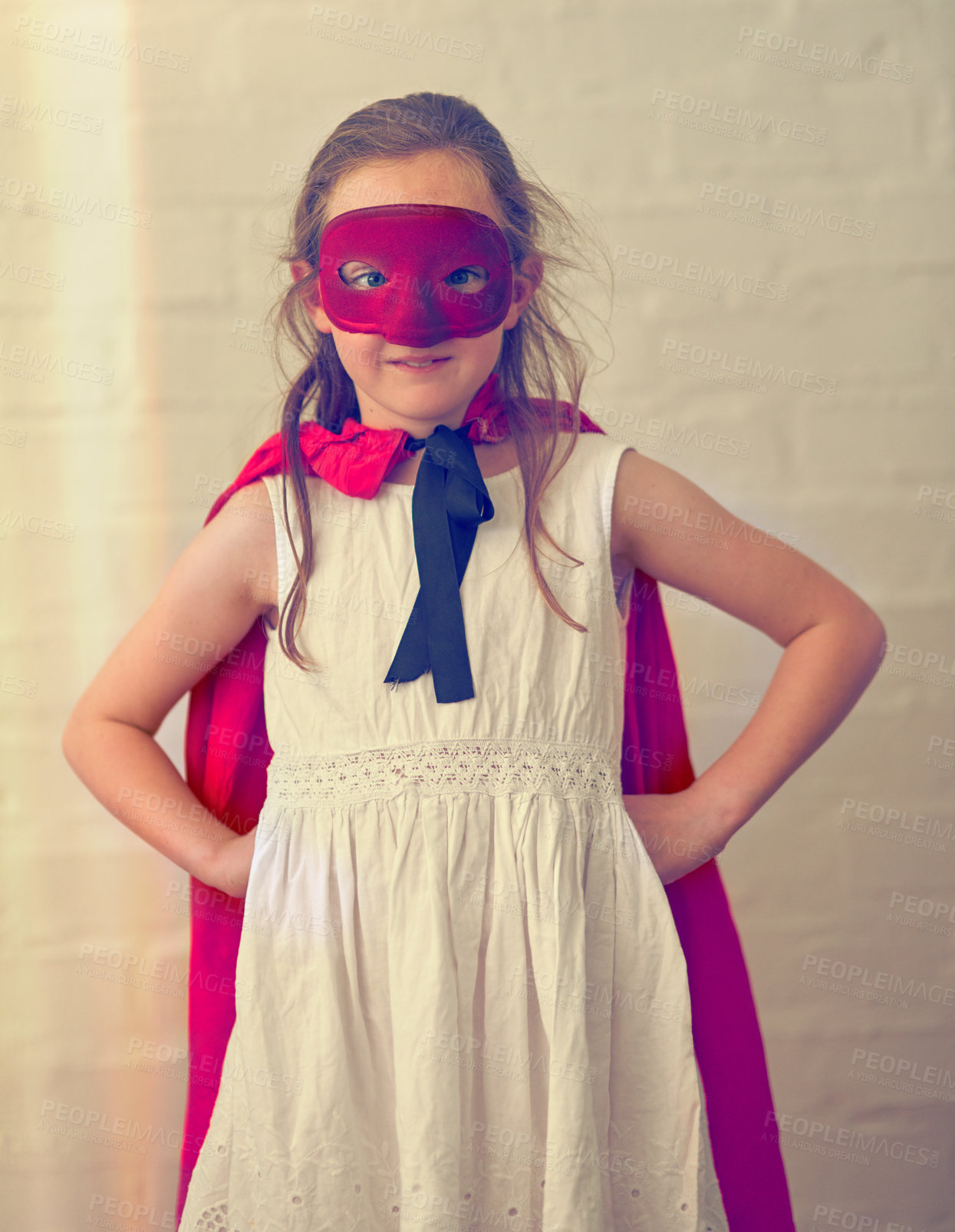 Buy stock photo Portrait of a little girl pretending to be a superhero