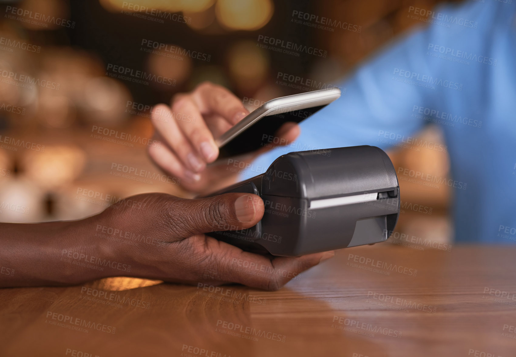 Buy stock photo Cropped shot of an unrecognizable woman making payment in a coffee shop