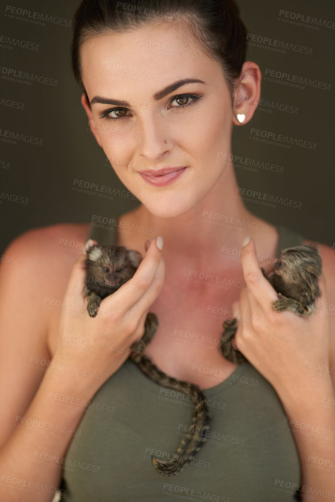 Buy stock photo Woman, portrait and monkey with pet, animal and primate in a studio with small, cute and Amazon creature. Happy, face and young pigmy marmoset with smile and grey background with love and care