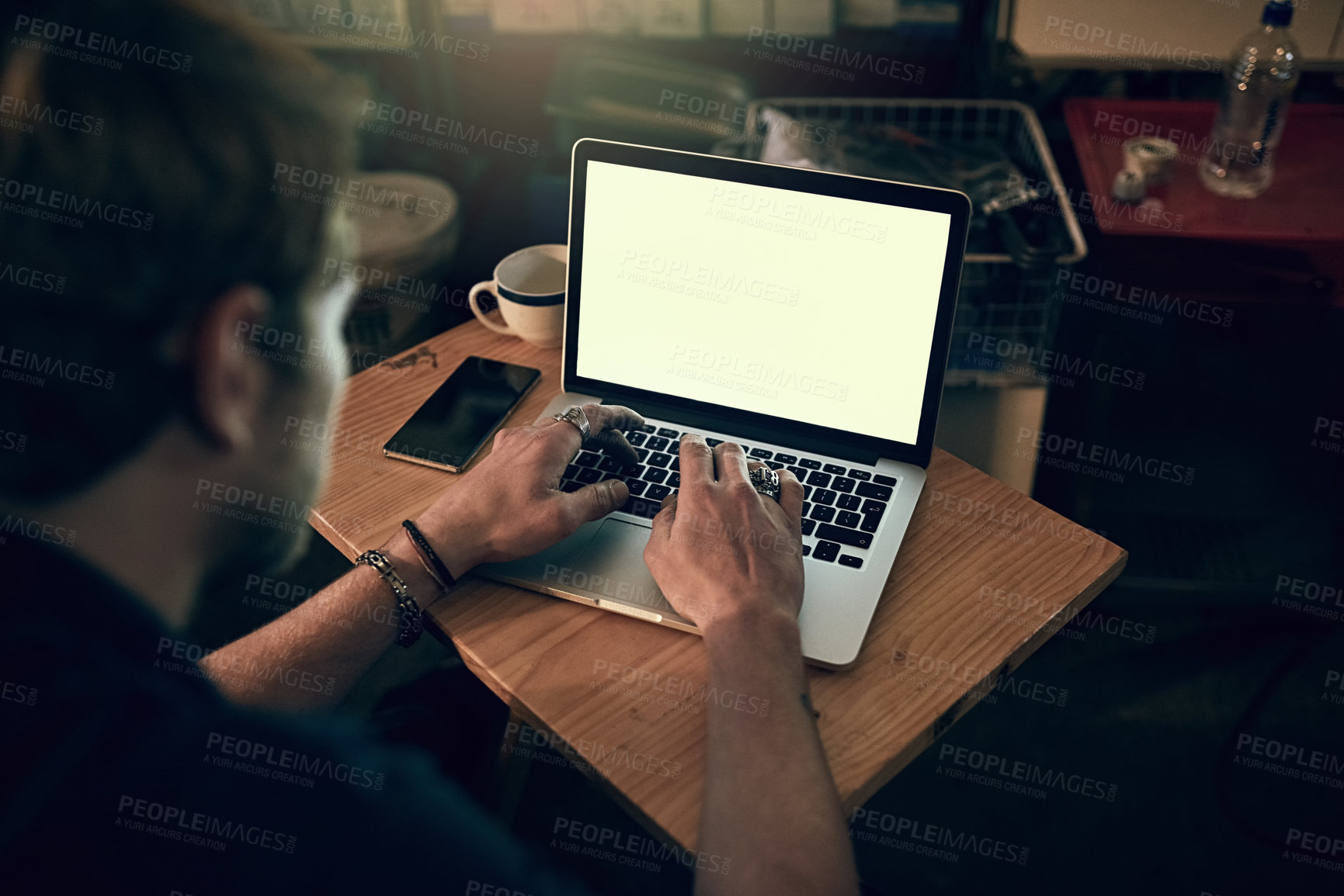 Buy stock photo Man, laptop and screen with typing at night for research, working on table startup business. Male entrepreneur, computer and internet for web design in dark cafe for career,  creative for branding