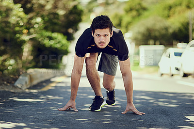 Buy stock photo Full length portrait of a handsome young man starting his run