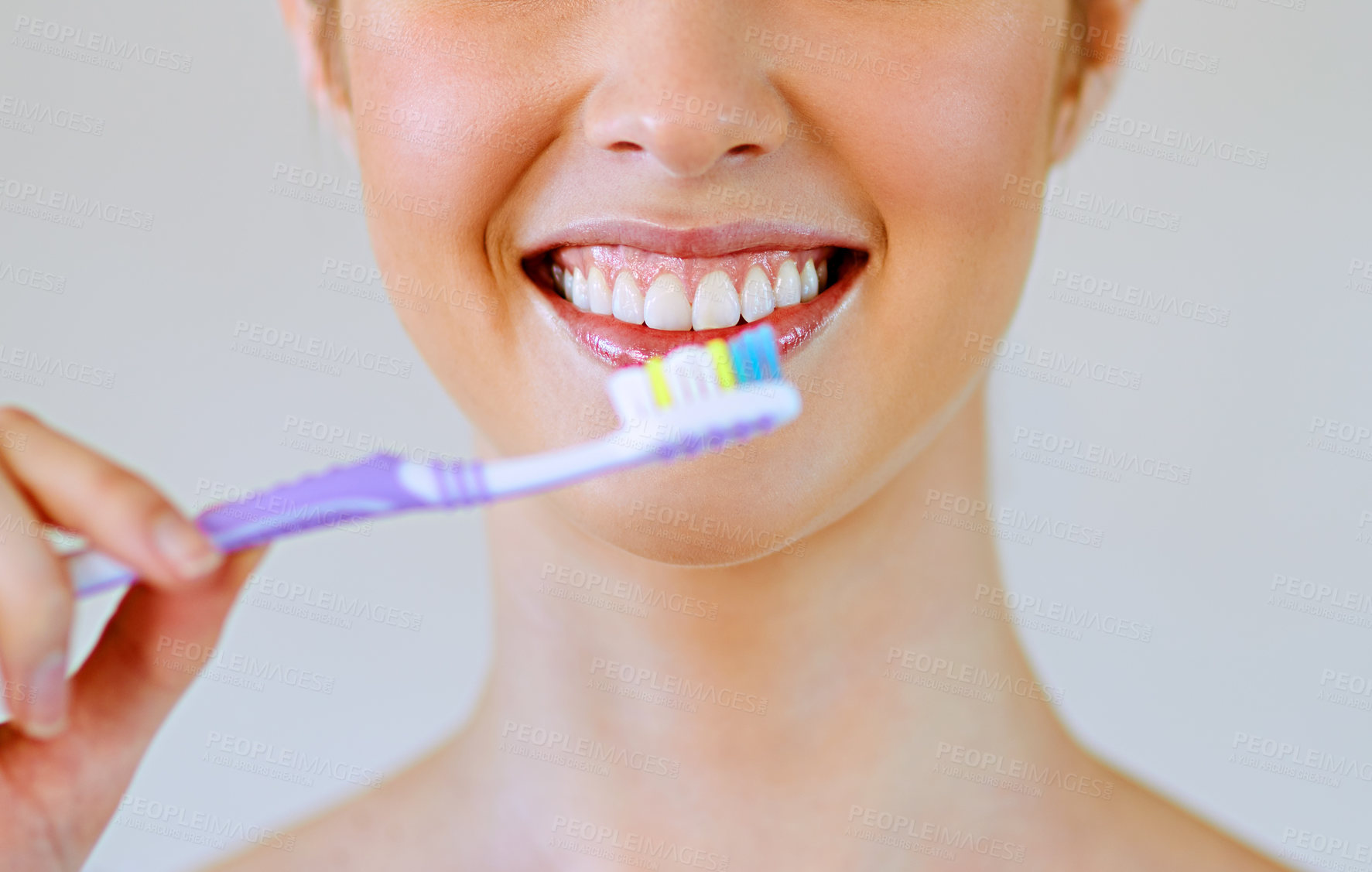 Buy stock photo Dental, toothbrush and woman brushing teeth in bathroom for oral care, hygiene or fresh breath on white background. Tooth, cleaning or girl with toothpaste, product or routine for bacteria prevention