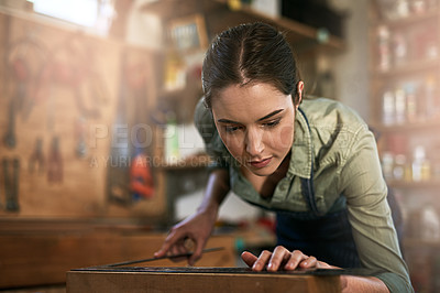 Buy stock photo Shot of a young female designer in her workshop