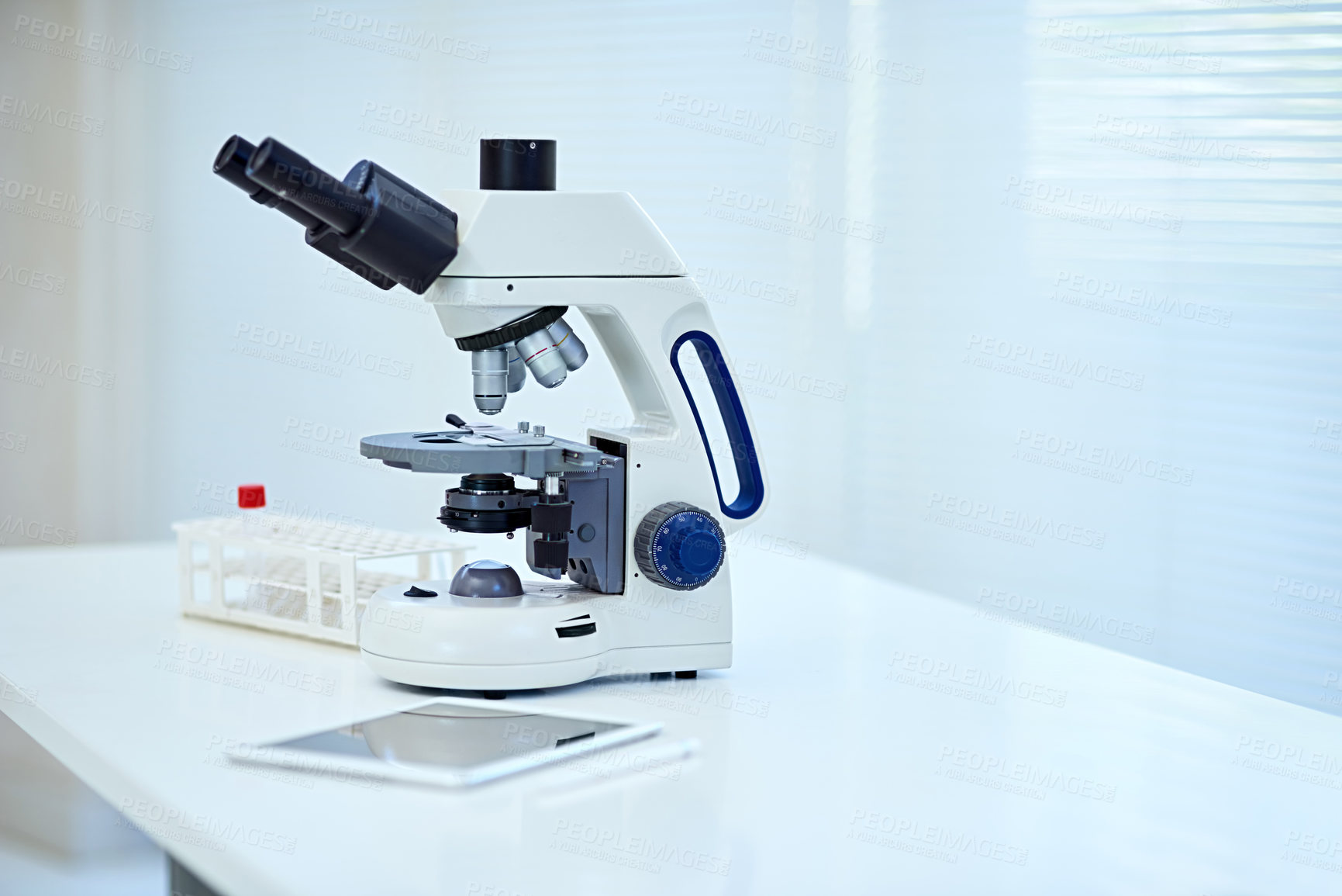 Buy stock photo Shot of a microscope in a laboratory