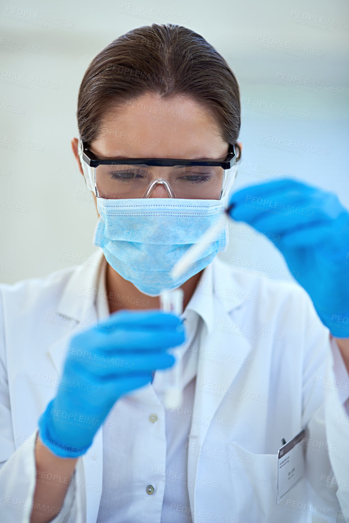 Buy stock photo Woman, scientist and test tube for scientific or research, reaction and experiment. Healthcare, mask and chemical vial with medial study or innovation for vaccine, cure and treatment or medicine