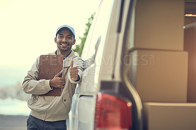Buy stock photo Portrait of a delivery man showing thumbs up while standing next to his van