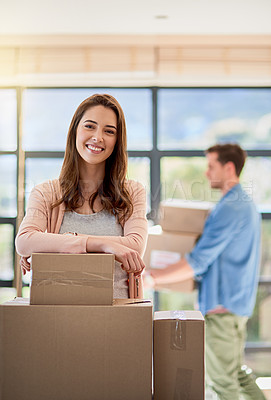 Buy stock photo Cropped shot of a young couple moving into their new home