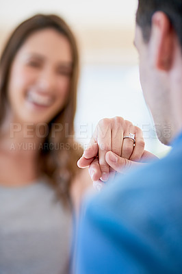 Buy stock photo Cropped shot of a young couple getting engaged