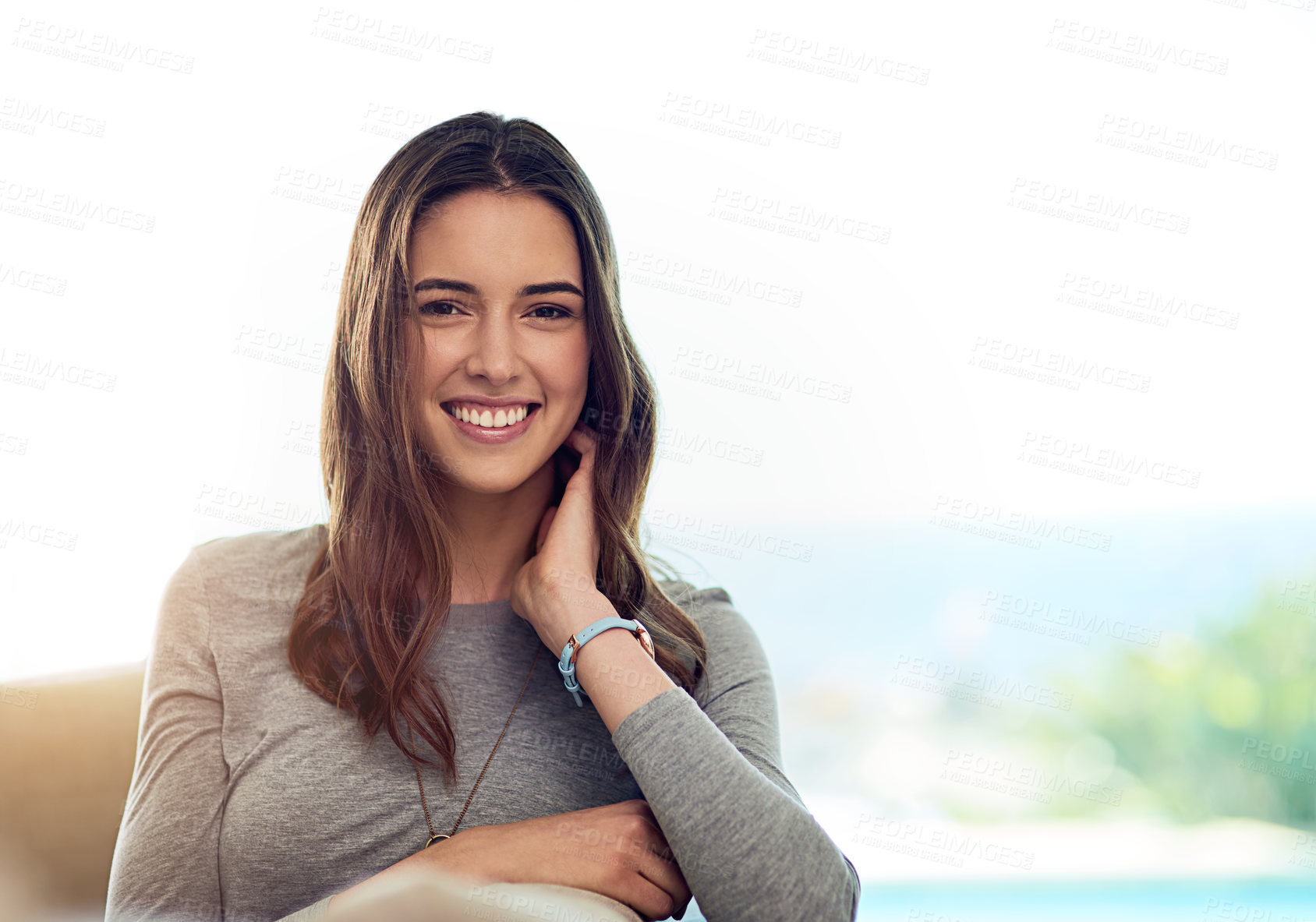 Buy stock photo Smile, portrait and woman on chair in home relaxing with positive, good and confident attitude. Happy, pride and young female person resting and sit in living room at modern apartment in Australia.