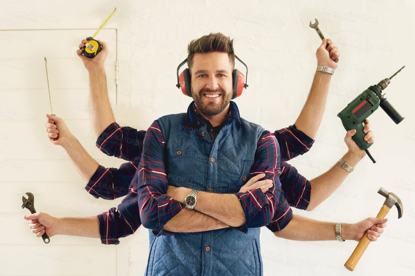 Buy stock photo Handyman, tools and multitask in workshop for portrait, busy and DIY or small business. Male carpenter, equipment and smile in workroom for pride, confident and skills in industry or maintenance