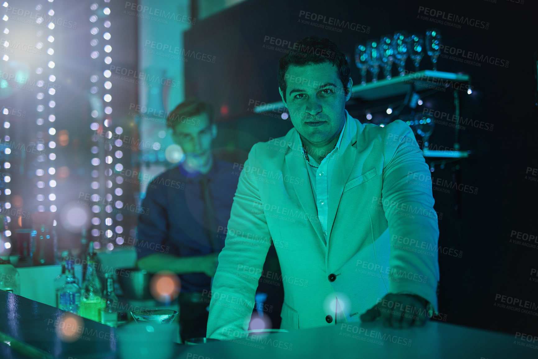 Buy stock photo Club, drink and portrait of a bartender working at a party, happy hour and night club event. Lens flare, alcohol server and barman at a dark nightclub for drinks, work and entertainment lifestyle