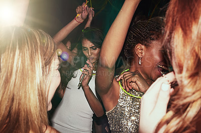 Buy stock photo Party women and dance at nightclub rave with glow sticks for cheerful fun, youth and celebration. Interracial, event and happy people dancing together in music club with energetic movement.